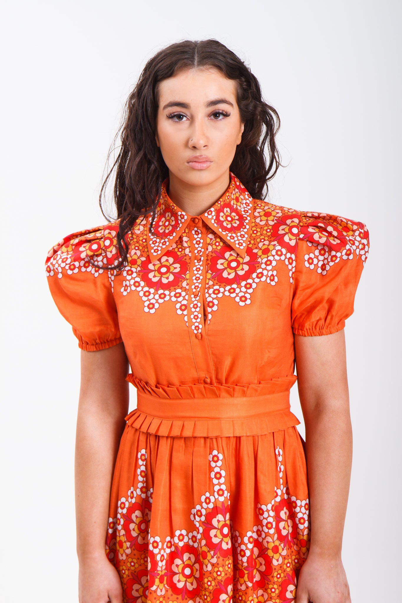 PRODUCT DESCRIPTION  Premium silk cotton linen, Orange unique mini shirt dress exclusive to MAZASHIE.  Vibrant Placement print on the bodice, short puff sleeves, collar and on the voluminous skirt.  Neckline with shirt collar and signature detachable, adjustable self-fabric belt.  Princess seams make a perfect fit.  Invisible side seam zip closure.  Self-covered button closure at front placket.  Fully lined in soft cotton.